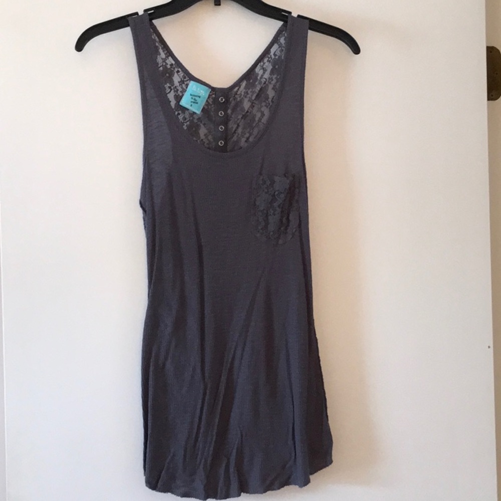 H.i.p. Happening in the present tank top